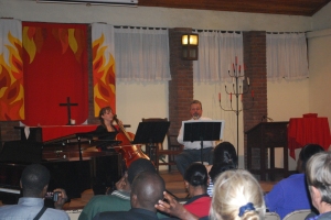 Megan and Dr. Ian Davidson performing at the Arusha Community Church