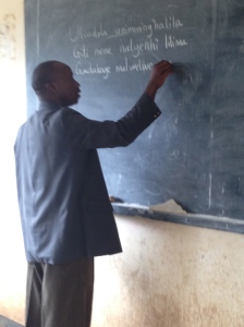 Manyenye preparing to teach a lesson at Uraki