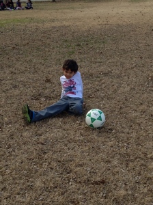 Tristan taking a break from playing soccer at Zilker Park