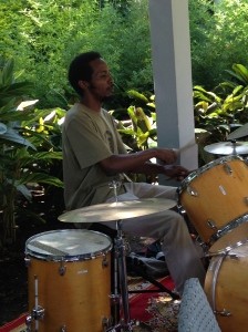 Hussein drumming at The Fig and Olive